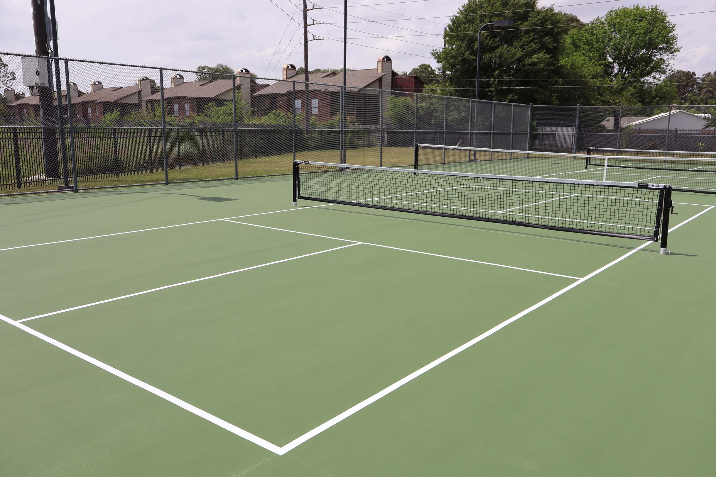 Austin Tennis Court Construction by Aguilar Athletics